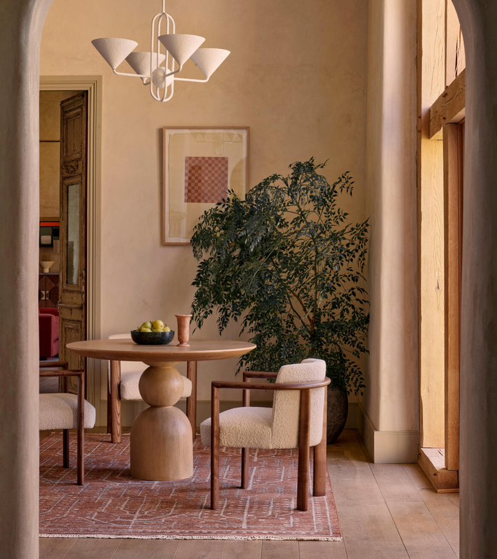 Lowden Round Oak Dining Table by Soho Home. Simple yet sculptural form creates a modern crafted look. Inspired by Soho House.