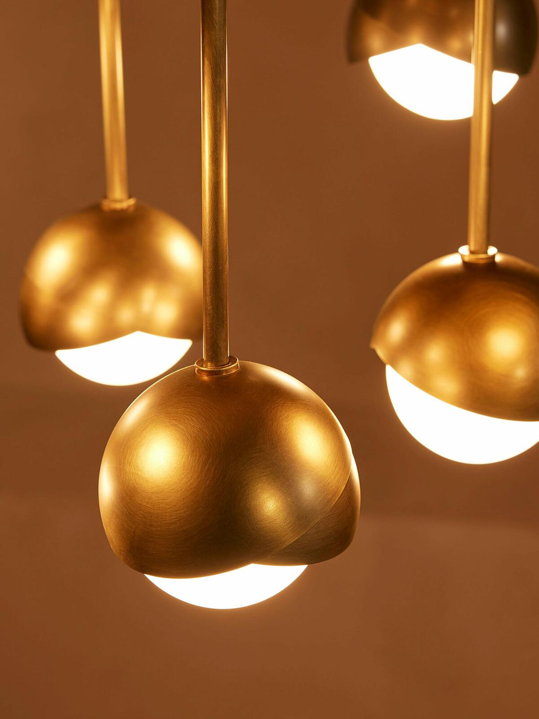 Seed Chandelier by Soho Home. Cluster of bisected orbs in hand-applied patinated brass. Inspired by Soho House.