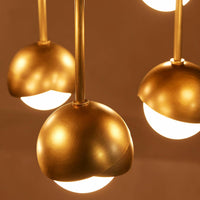 Seed Chandelier by Soho Home. Cluster of bisected orbs in hand-applied patinated brass. Inspired by Soho House.