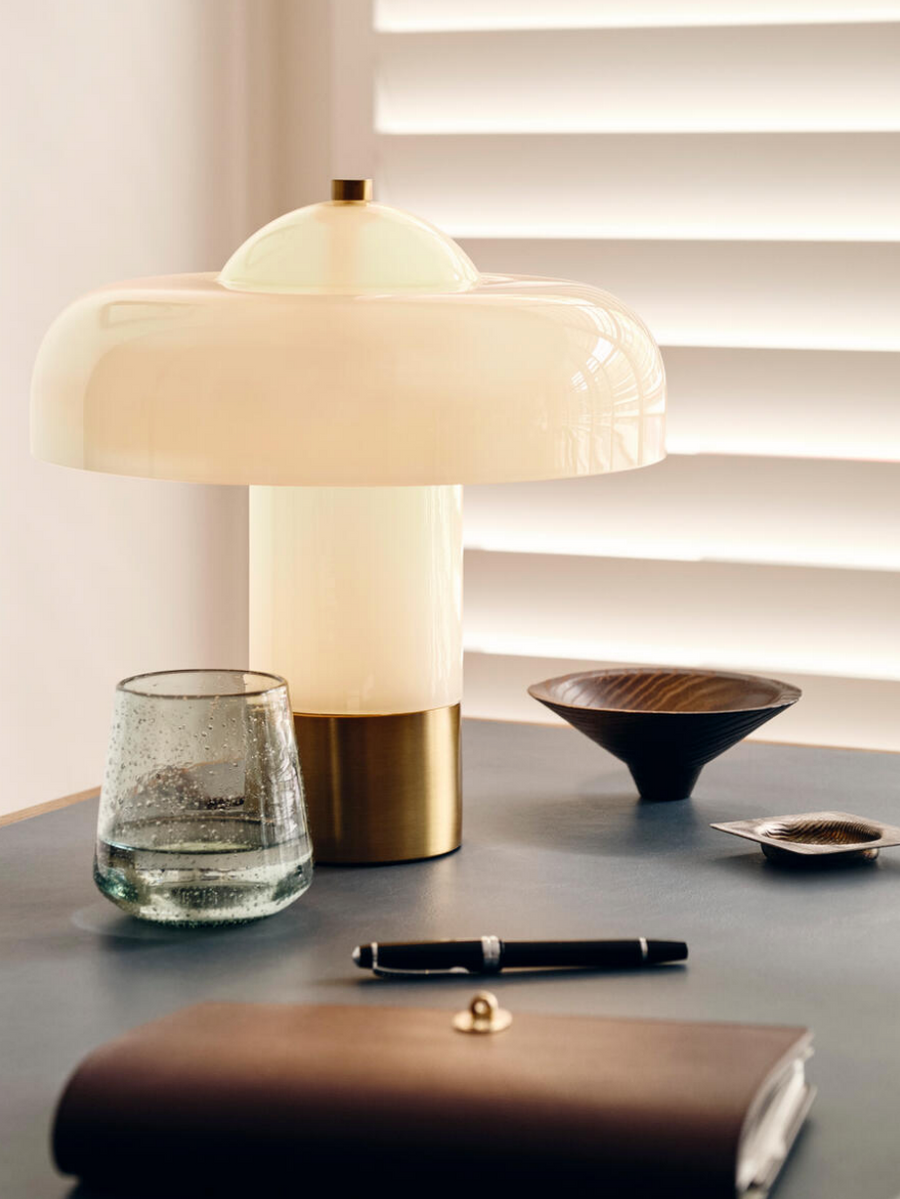 Soho Home Giovanni Table Lamp Cream. Crafted white domed glass. Aged brass details. Dimmable light.